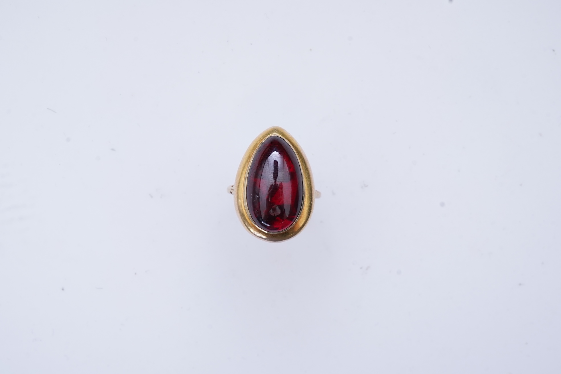 An unusual garnet locket ring, late 19th century composite